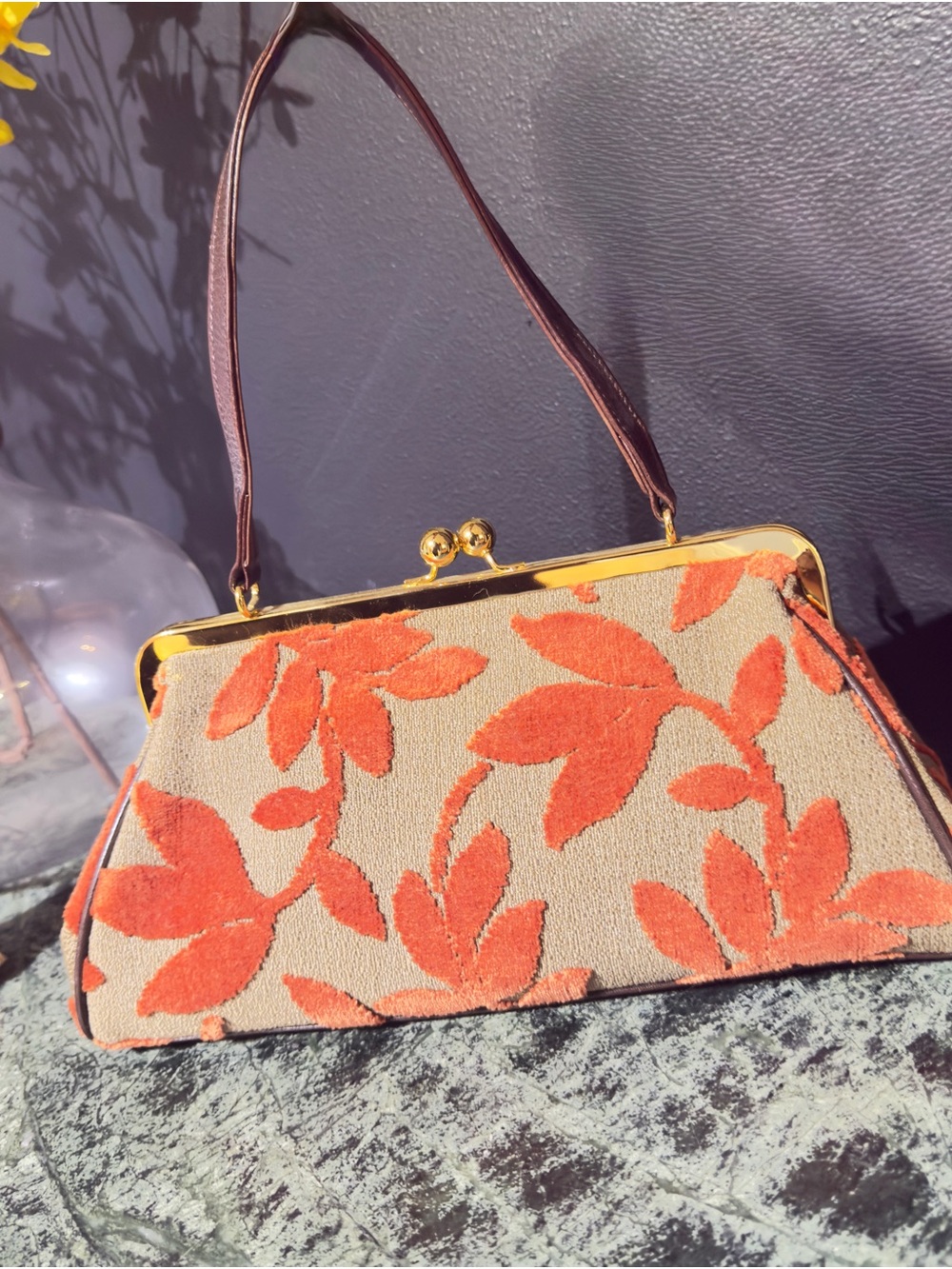 Glenda Gies Classic Beige Handbag with Orange Leaf Motif and Gold Frame